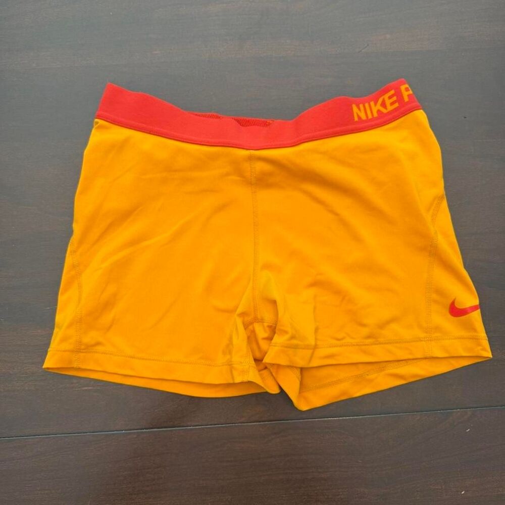 Nike Women's Yellow and Orange Shorts